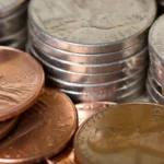 How many pennies are in $100: Market Outlook, Risks, and Key Things to Watch
